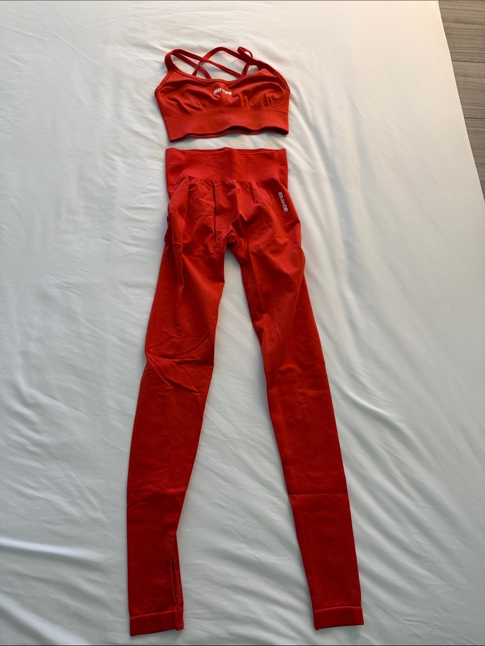 High-Waist Seamless Red Leggings with Matching Strappy Sports Bra